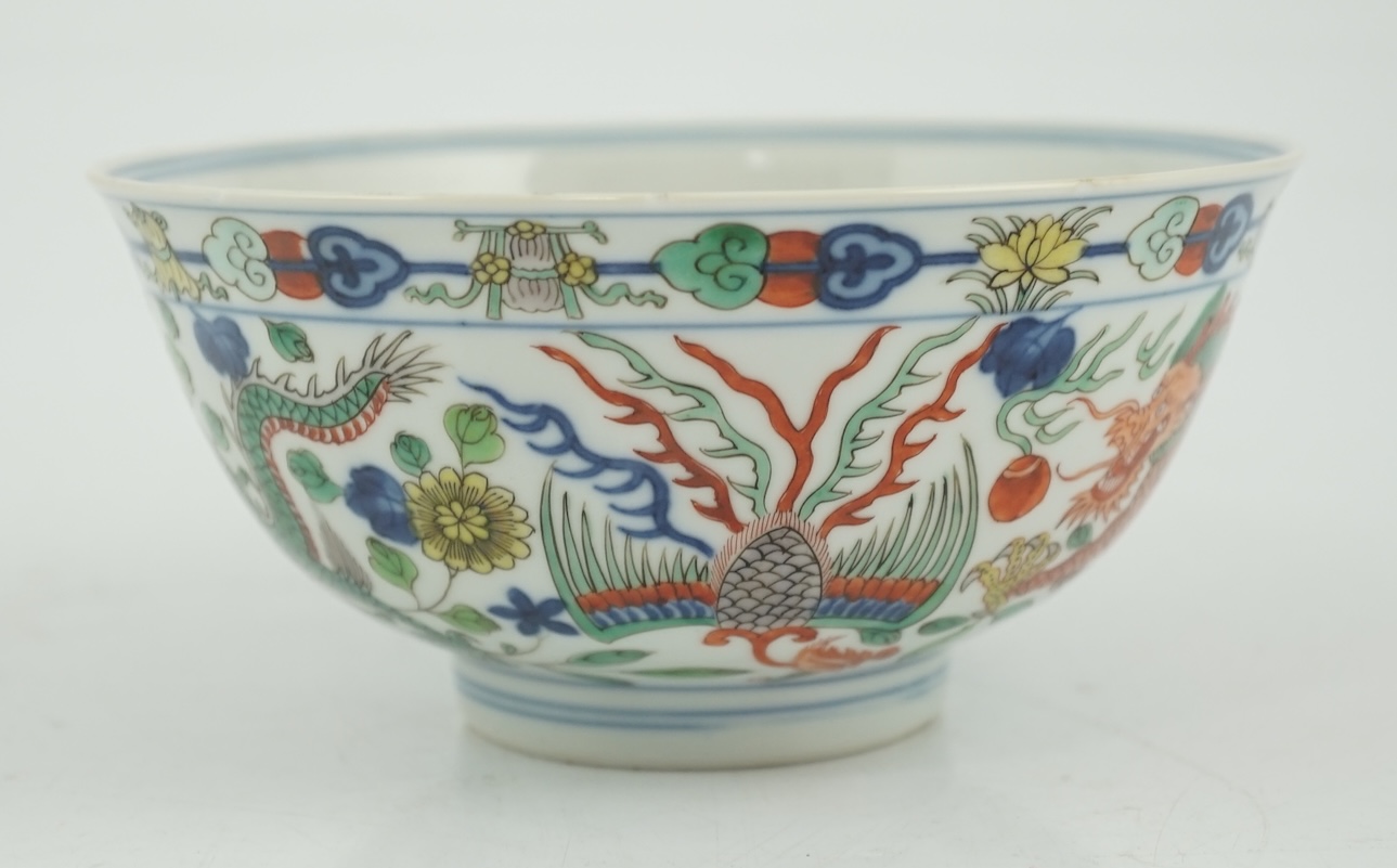 A Chinese wucai ‘dragon and phoenix’ bowl, early 20th century, diameter 15cm